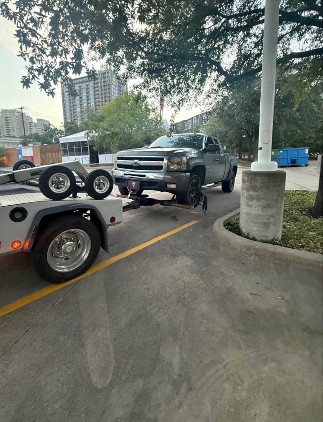 Pickup hooked up for towing